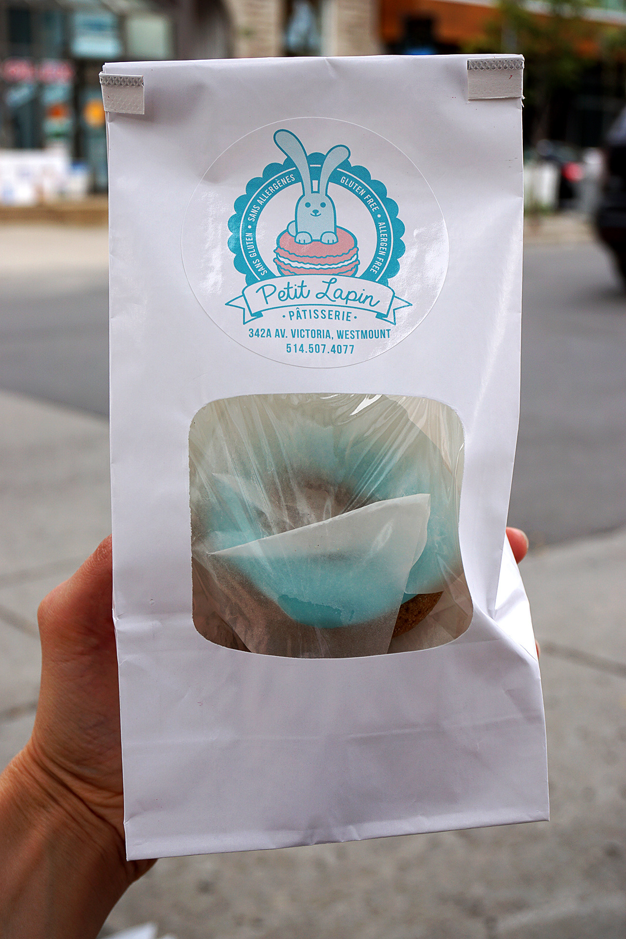 Gluten free doughnut in a bag from Petit Lapin Bakery - gluten free bakery in Montreal, Quebec, Canada