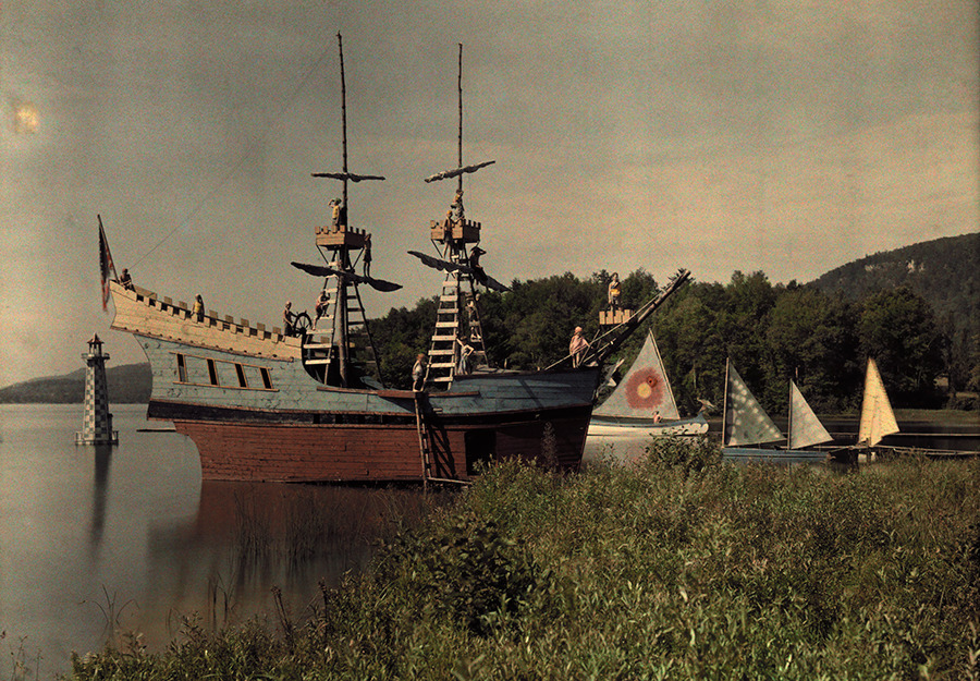 A view of ships and canoes docked in the harbor for summer camp fun at the Lanakila Camp for Boys in Vermont, 1927.Photograph by Clifton R. Adams, National Geographic Creative