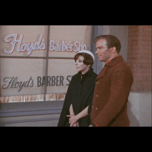 danagould:

Fun Fact! The Star Trek classic City On The Edge Of Forever re-used exterior sets from The Andy Griffith Show. Here’s Kirk & Edith Keeler strolling past Floyd’s.
How many of you ladies are turned on right now?
