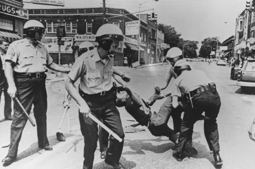 Man carried away by police during riots, Baltimore, Maryland, 1968. via reddit