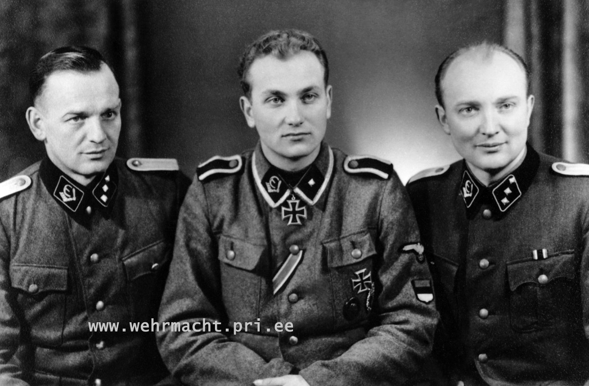 A rare photo of my favorite Estonian Volunteer, Knights Cross winner Harald Nugiseks (center) Pictured here as an SS-Unterscharführer in the 20th Waffen Grenadier Division of the SS (1st Estonian). Its such a shame he died in January :( 