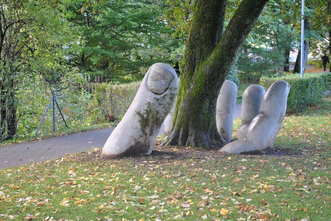 sixpenceee:This amazing sculpture is called The Caring Hand and is located in Glarus, Switzerland.
Comment by JTK.CA (http://NudeCreations.TUMBLR.com): 

Seeing this photo today reminds me of a poem I wrote a couple of decades ago, in which I imagined a “colossal, concrete hand,” a lot like that one! Enjoy my poem: 

“IT’S SO OBNOXIOUS!” by JTK.CA 

February Two. 
The groundhog saw his shadow. 
Six more weeks of winter. 

February Two. 
The shadow saw his groundhog 
And laughed in his face, 

**********Ho! Ho! Ho! 
**********It feels like spring; 
**********The snow is melting, 
**********And this poet 
**********Sits outside on a bench, 
**********Writing with his bare, warm hands **********Onto snowy-white paper, 

********************It’s so obnoxious 
********************The way that that song 
********************Playing on my radio 
********************Sings my biography! 
********************How did they know? 
********************How did they know? 

Snow melts into slush 
In the palm of a colossal, concrete hand, 
And its gargantuan, bulky fingers (curved like talons) 
Seem to exclaim the exclamation 
To birds flying overhead, 

**********Spring dances again! 
**********Welcome home, my friends! 

© Tad (http://JTK.CA) NudistPoet (http://NudeCreations.com) a.k.a. Jonathan Tad Ketchen http://TadCreations.com &amp; http://NudistPoet.com 
Guelph (pronounced “Gwelf”), Ontario, Canada, eh? 
JTK.CA@JTK.CA 
519­­-­830-4812 http://NudeCreations.TUMBLR.com