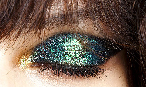 Iridescent eye makeup by Pat McGrath at John Galliano Spring/Summer 2015