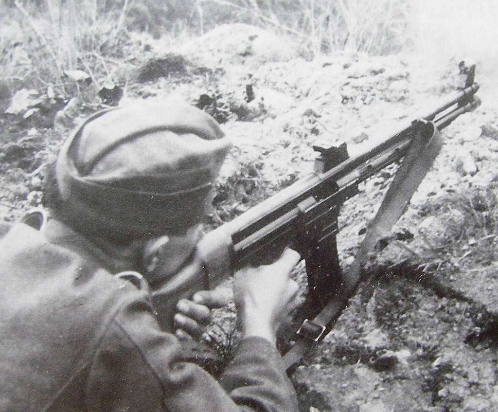German soldier, armed with an assault rifle Mkb.42 (H). Mkb.42 (H) (Maschinencarabin 42 Haenel Scmeiser) was the first version of the Stg.44. 