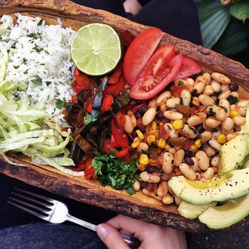 jessicasodenkamp:

I’m eating this RIGHT NOW. Cilantro-lime rice (rice + cilantro + lime juice + cumin), fajitas (red bell pepper, poblano pepper, diced onion, chili powder, lime juice), cannellini beans (beans, corn, cilantro, diced tomato, salsa, cumin, chili powder, smoked paprika, lime juice). Served with lettuce and lime on the side, and of course, avocado. 😋
