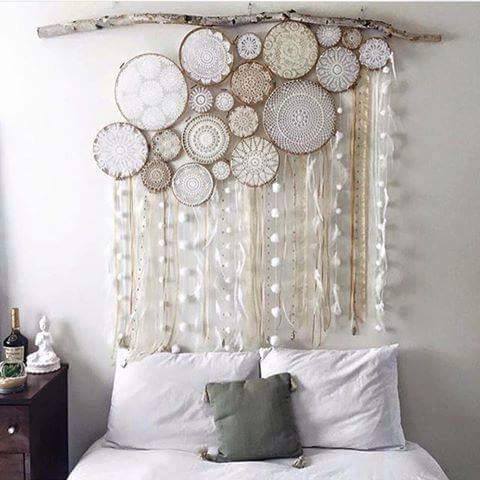 Embroidery hoops, laces and trims wall art idea