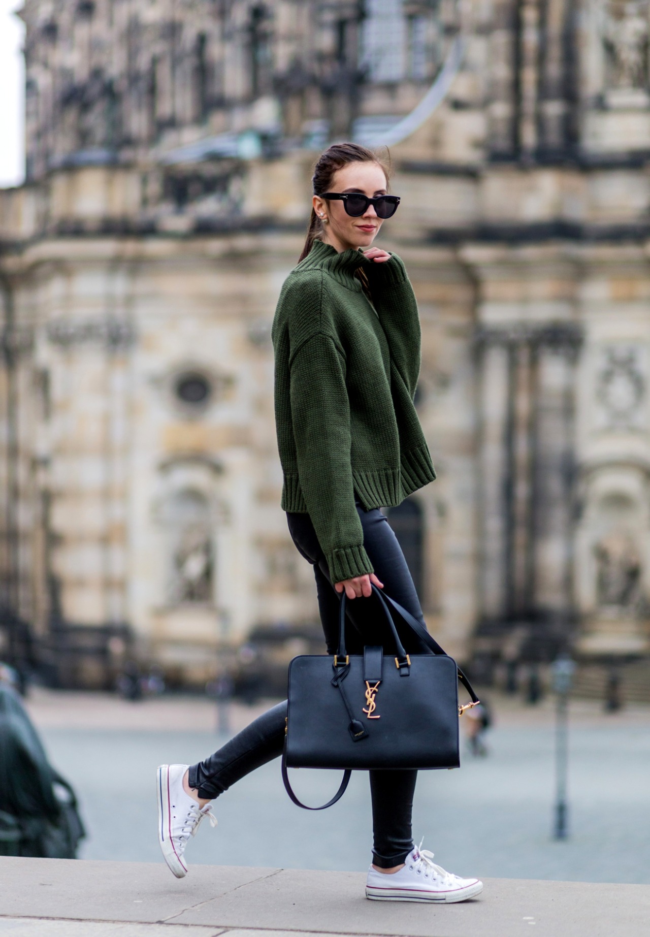 White converse can also make the perfect match to a knitwear look, like this stylish oversized bottle green sweater worn by Barbora Ondrackova with converse and leather leggings. Jumper: Asos, Leggings: Balenciaga, Sneakers: Converse. 