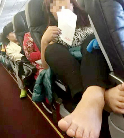 Candid asian soles in park