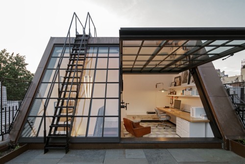 stunning attic workspace with direct rooftop access