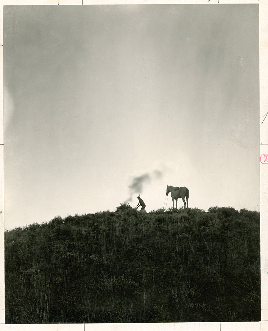 A Native American sends smoke signals in Montana, June 1909.Photograph by Dr. Joseph K. Dixon, National Geographic Creative