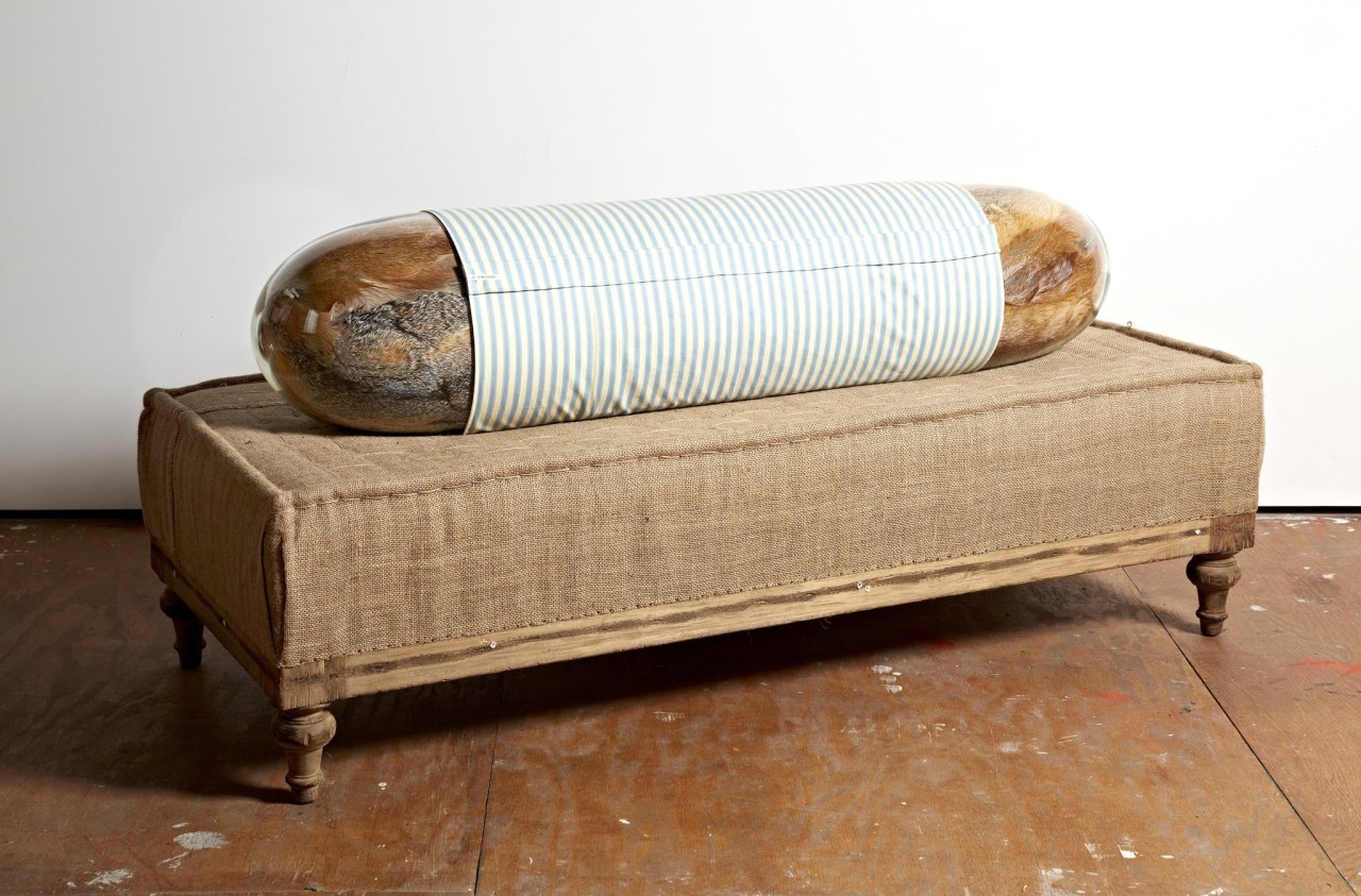 Adeline de Monseignat
The Body (aka The Eclair), 2013
Vintage fur, hand-blown glass, pillow filler, sika block, fabric and buttons
69 &frac34; x 15 x 17 3/8 in
177.2 x 38.1 x 44.1 cm
 
Adeline de Monseignat (b. 1987, Monaco)
Adeline de Monseignat lives and works in London. Themes around the body, fertility, sexuality and origin are recurrent in her&rsquo;s practice, often dealt in her sculptures and installations with organic, sensual and fragile materials such as fur, coffee, eggshells, and wood, in order to let these materials do what the body itself does: yield to the damages of time.  With influences such as Meret Oppenheim, Louise Bourgeois, Eva Hesse and Gabriel Orozco, her work falls into a genre of sculpture known as &lsquo;soft sculpture&rsquo;. (via the artist's statement)
Monseignat received her MA in Fine Art with Distinction from City &amp; Guilds of London Art School. Following her graduation, she has begun showing her work in the UK, America and Berlin. She recently completed a residency at Pioneer Works in Redhook, Brooklyn, and participated in a group exhibition titled Dead Inside at Bleecker Street Arts Club. Currently, her works are on view at Gerson Zevi in London as part of the exhibition The London Project, which will be on view through November 1, 2013.