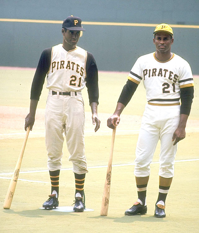 Pirates outfielder Roberto Clemente stands next to statue of himself  before a 1970 game against the Astros.
SI VAULT: The meaning of Roberto Clemente (4.10.06)