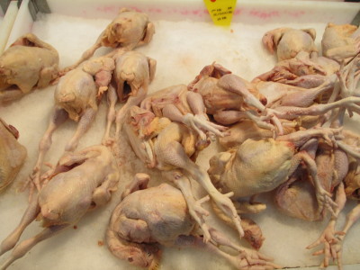 the locals want to see the whole chicken to know that they are getting a good product