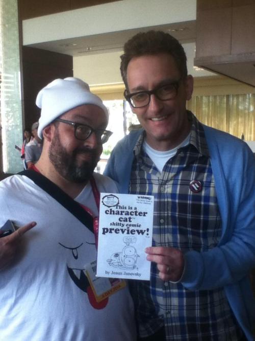 tumblrtoons: Day 5 #inktober!  Character Cat takes a Moon Selfie!  Tom Kenny, aka the mayor of townesville, aka the ice king, aka spongebob, (and quite possibly aka: future Character Cat someday?) and I at SDCC ‘14 holding up his copy of the Character Cat Mini! -Jeaux 