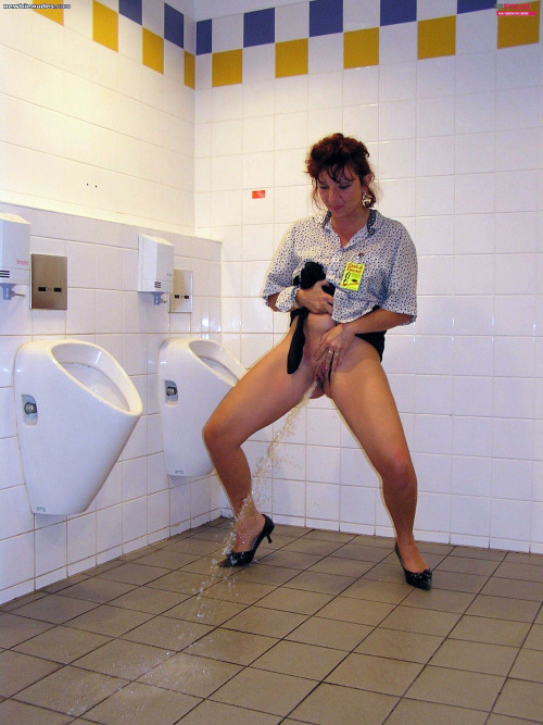 Naked in public girl peeing in toilet