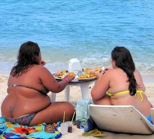 Fat lady on beach