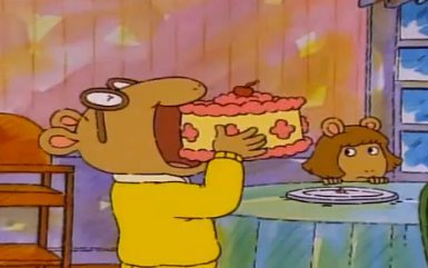 Pictured: PBS's Arthur eating cake