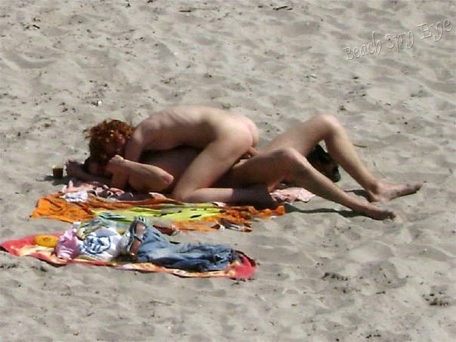 Nude beach voyeur couple having sex