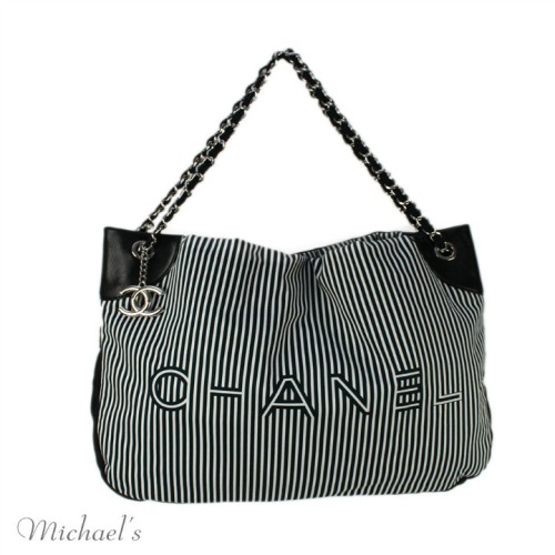 ... miss out on this black and white striped #Chanel quilted bag!! 1725