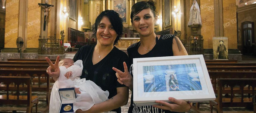 Outrising Argentinian President Becomes Godmother To