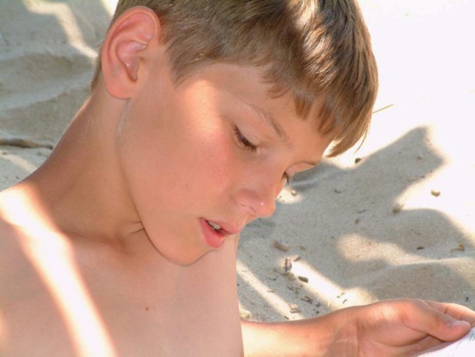 Enigmatic boy nude beach