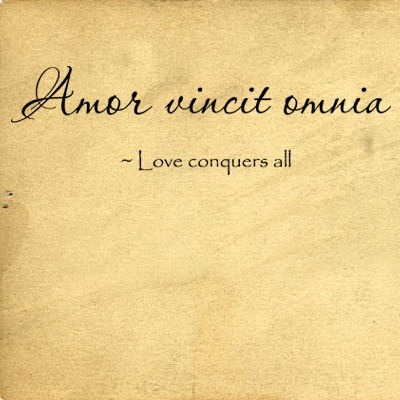 Love conquers all latin tattoo