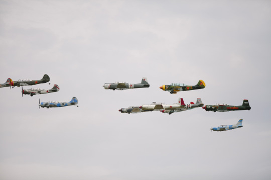 A motley squadron of Wold War II-era, Russian-made Yakovlev aircraft, which formed the backbone of the Red Army’s air force. The planes performed a glorious flyover on Monday. Image credit: Adam Senatori/GE Reports