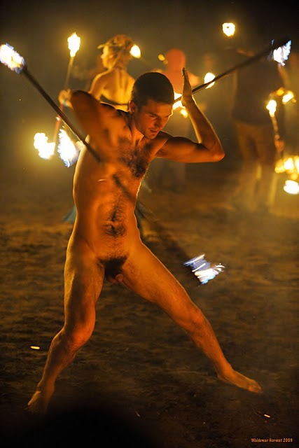 naked fire-spinner