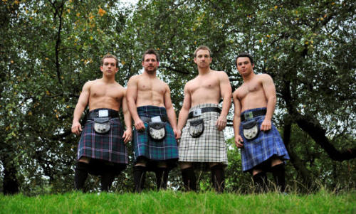 Men in kilts with tattoos